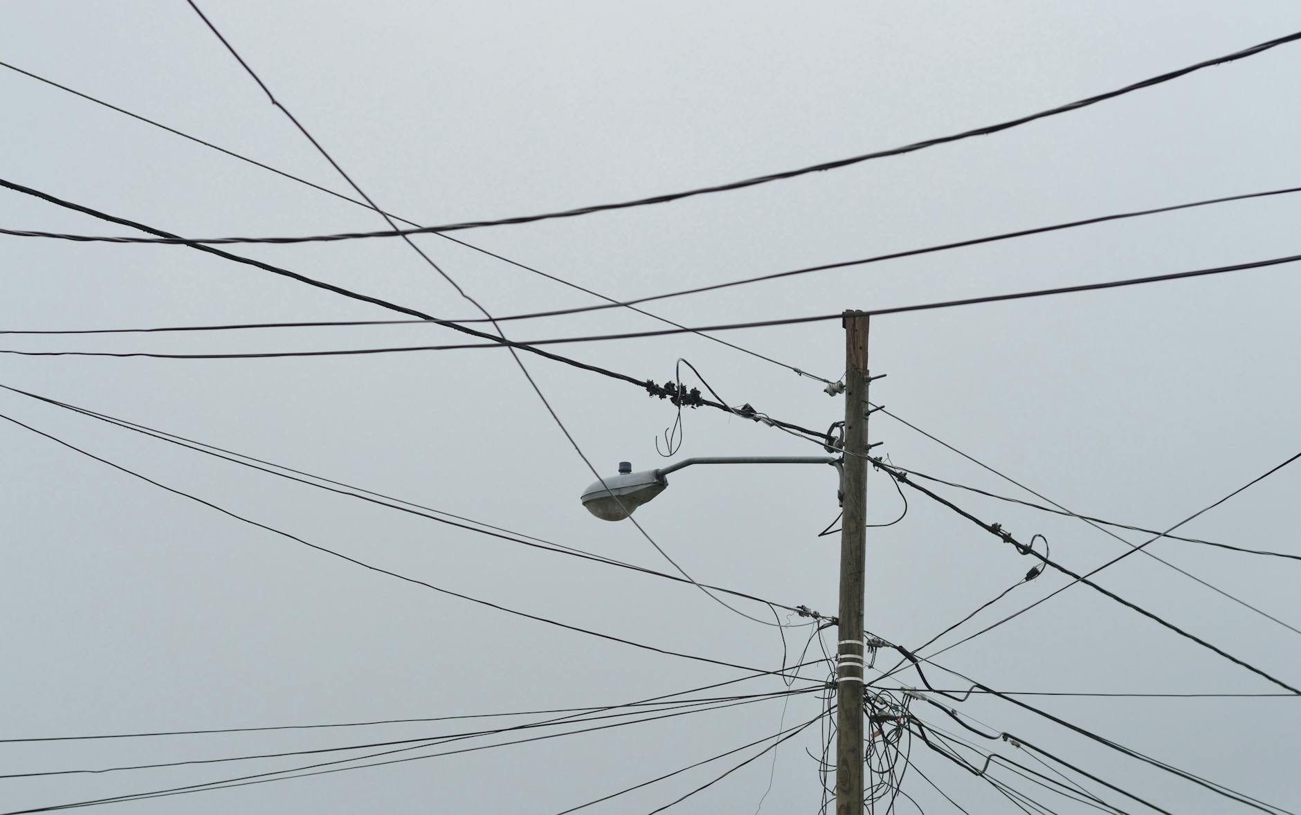 gray electric post with light