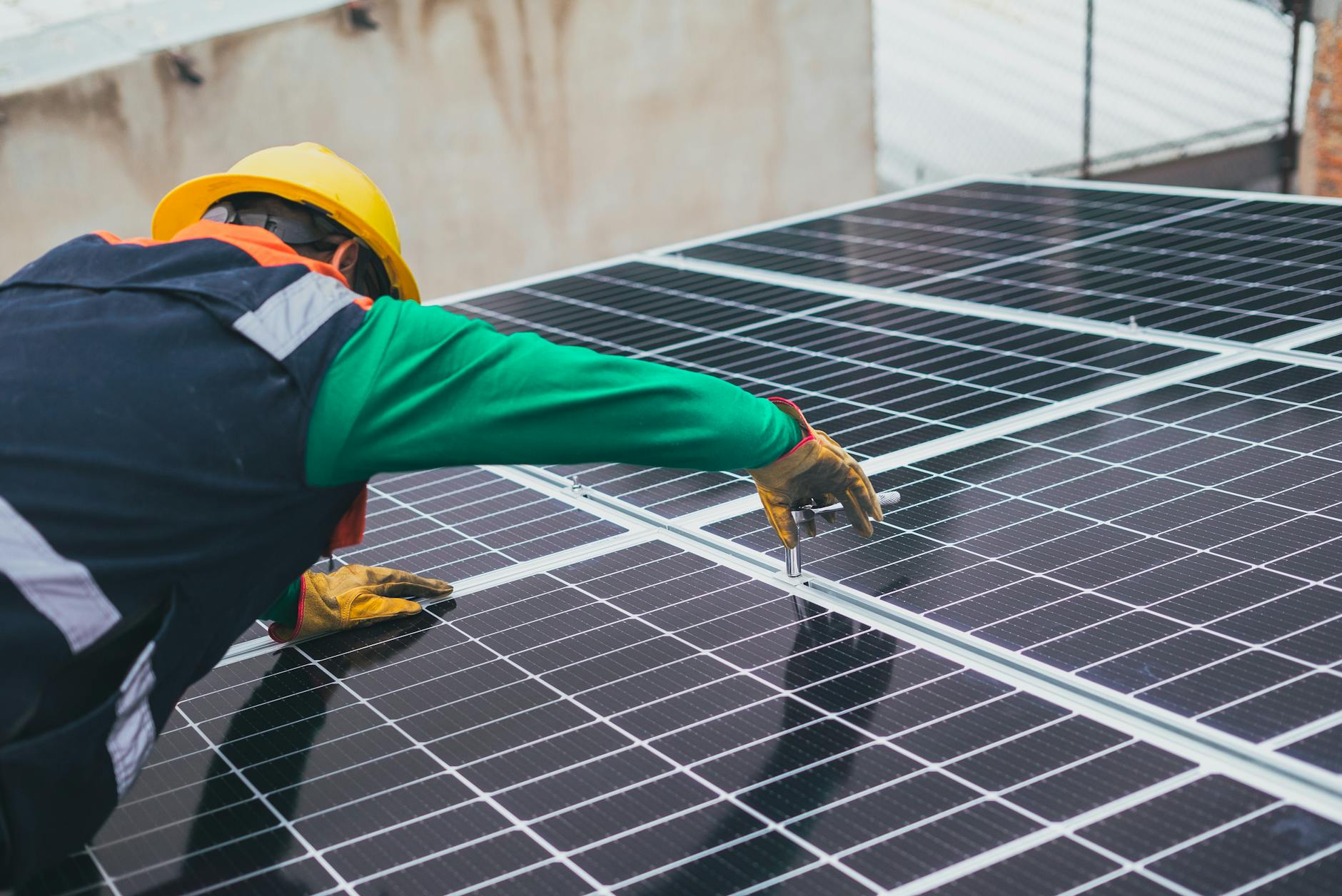 solar technician installing solar panel