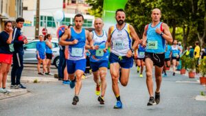 four men running on